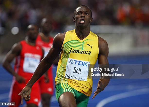 Usain Bolt of Jamaica crosses the line to win the gold medal in the men's 100 Metres Final during day two of the 12th IAAF World Athletics...