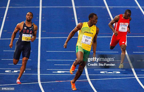 Tyson Gay of United States, Usain Bolt of Jamaica and Daniel Bailey of Antigua and Barbuda compete in the men's 100 Metres Final during day two of...