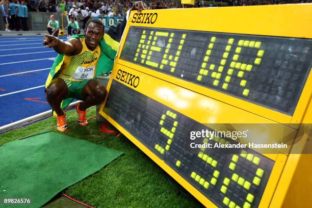 Usain Bolt of Jamaica celebrates winning the gold medal in the men's 100 Metres Final during day two of the 12th IAAF World Athletics Championships...