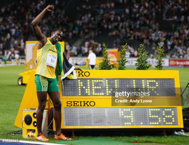 Usain Bolt of Jamaica celebrates winning the gold medal in the men's 100 Metres Final during day two of the 12th IAAF World Athletics Championships...