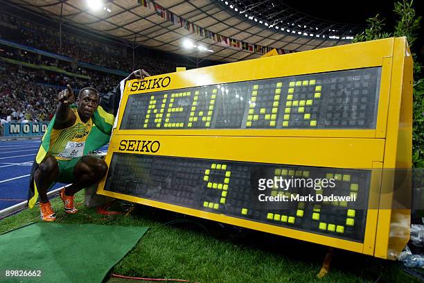 Usain Bolt of Jamaica celebrates winning the gold medal in the men's 100 Metres Final during day two of the 12th IAAF World Athletics Championships...