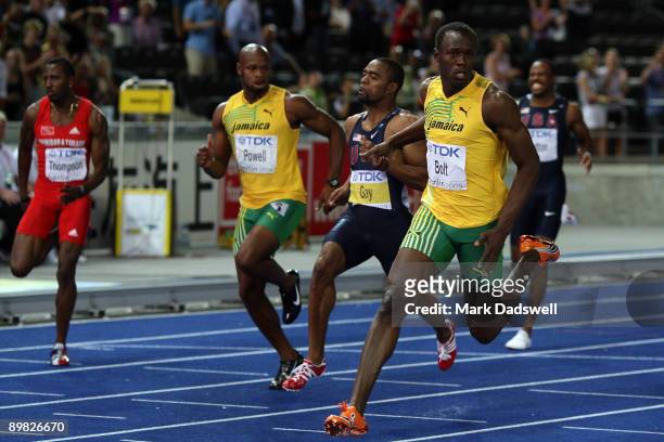 Usain Bolt of Jamaica crosses the line to win the gold medal in the men's 100 Metres Final during day two of the 12th IAAF World Athletics...