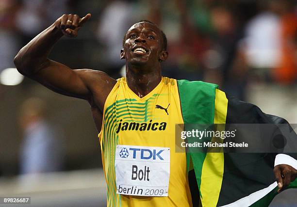 Usain Bolt of Jamaica celebrates winning the gold medal in the men's 100 Metres Final during day two of the 12th IAAF World Athletics Championships...