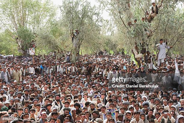 Supporters gather to listen to Afghan presidential candidate and former foreign minister Dr Abdullah Abdullah in his heartland province of Takhar on...