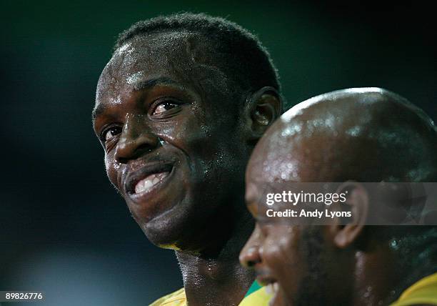 Usain Bolt of Jamaica celebrates winning the gold medal in the men's 100 Metres Final during day two of the 12th IAAF World Athletics Championships...