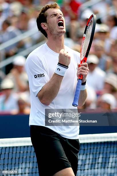 Andy Murray of Great Britain celebrates breaking Juan Martin Del Potro of Argentina in the second set during the men's final of the Rogers Cup at...