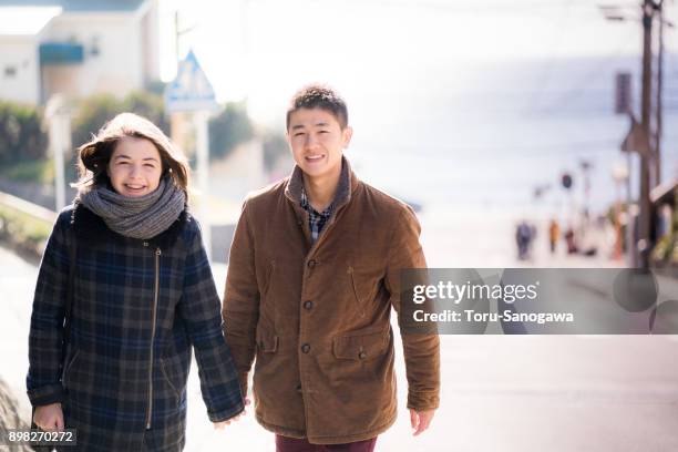 young adult  in shonan - enoshima island stock pictures, royalty-free photos & images