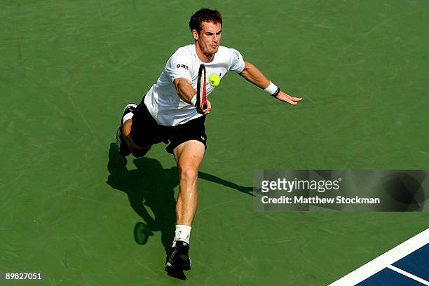 Andy Murray of Great Britain returns a shot to Juan Martin Del Potro of Argentina during final of the Rogers Cup at Uniprix Stadium on August 16,...