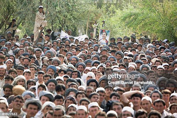 Supporters gather to listen to Afghan presidential candidate and former foreign minister Dr. Abdullah Abdullah in his heartland province of Takhar on...