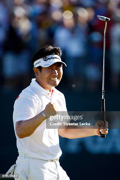 Yang of South Korea celebrates his three-stroke victory on the 18th green during the final round of the 91st PGA Championship at Hazeltine National...