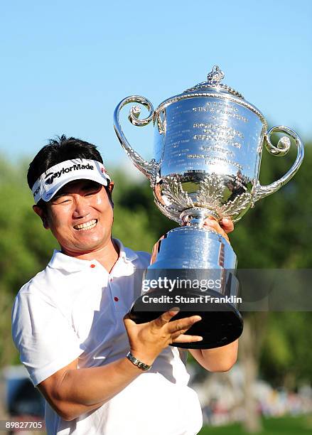 Yang of South Korea poses with the Wanamaker Trophy after his three-stroke victory at the 91st PGA Championship at Hazeltine National Golf Club on...