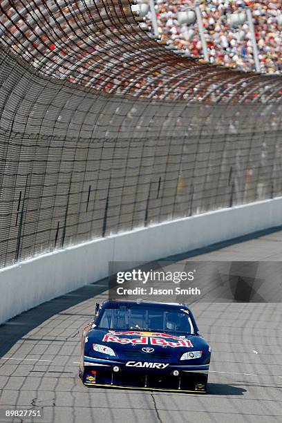 Brian Vickers, driver of the Red Bull Toyota, races during the NASCAR Sprint Cup Series CARFAX 400 at Michigan International Speedway on August 16,...