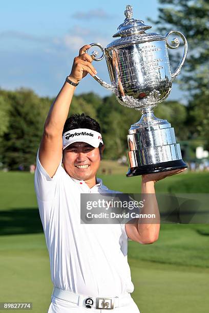 Yang of South Korea poses with the Wanamaker Trophy after his three-stroke victory at the 91st PGA Championship at Hazeltine National Golf Club on...
