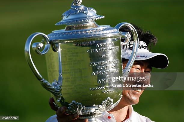 Yang of South Korea poses with the Wanamaker Trophy after his three-stroke victory at the 91st PGA Championship at Hazeltine National Golf Club on...