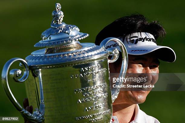 Yang of South Korea poses with the Wanamaker Trophy after his three-stroke victory at the 91st PGA Championship at Hazeltine National Golf Club on...