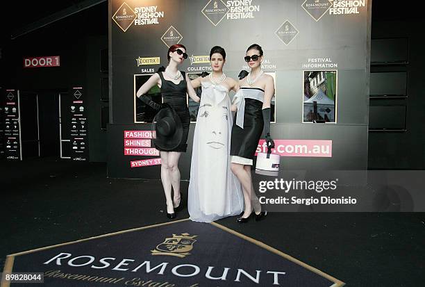 Australia's Next Top model winners Alice Burdeau, Tahnee Atkinson and Demelza Reveley made-up to look like screen star Audrey Hepburn, pose to...
