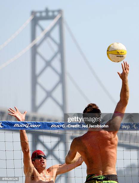 Brad Keenan blocks a shot during his match with teammate Nick Lucena against Matt Olson and Kevin Wong at the AVP Crocs San Francisco Open on August...