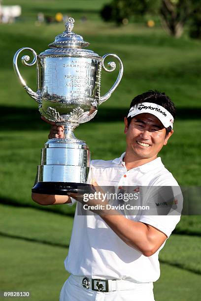 Yang of South Korea poses with the Wanamaker Trophy after his three-stroke victory at the 91st PGA Championship at Hazeltine National Golf Club on...