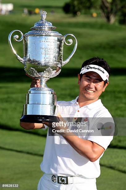 Yang of South Korea poses with the Wanamaker Trophy after his three-stroke victory at the 91st PGA Championship at Hazeltine National Golf Club on...