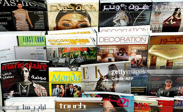 Arabic editions of France-based magazines Elle and Marie-Claire magazines are displayed at a shop in the Gulf emirate of Abu Dhabi on August 13,...