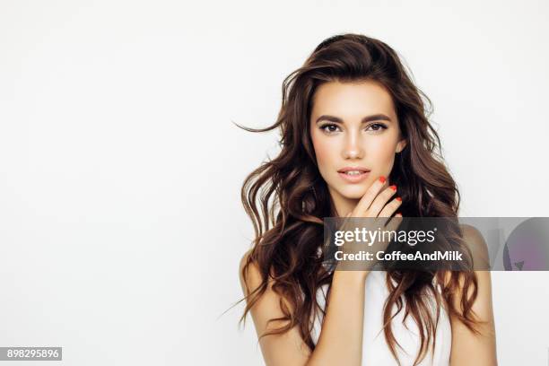 studio shot of young beautiful woman - hairstyle stock pictures, royalty-free photos & images