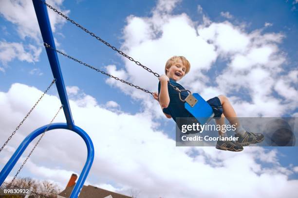 8,072 Boy On A Swingset Stock Photos, High-Res Pictures, and