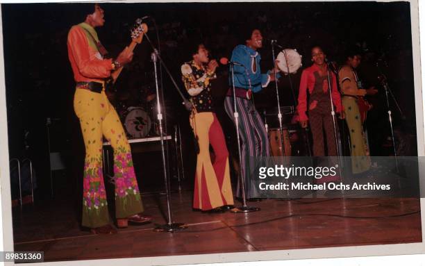 American singer Michael Jackson and the Jackson Five in concert, circa 1970.