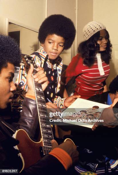American singer Michael Jackson backstage with his brother Tito , January 1972.