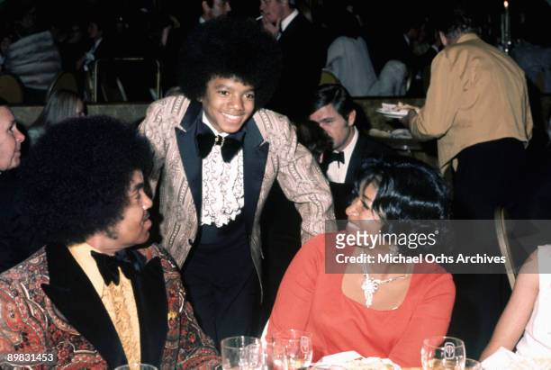 American singer Michael Jackson with his parents, Katherine and Joseph, at the Golden Globes, held at the Century Plaza Hotel, Los Angeles, 28th...