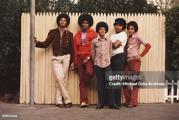 The Jackson brothers pose for a portrait in the backyard of their home, Los Angeles, 1972. From left to right, Jackie Jackson, Jermaine Jackson,...