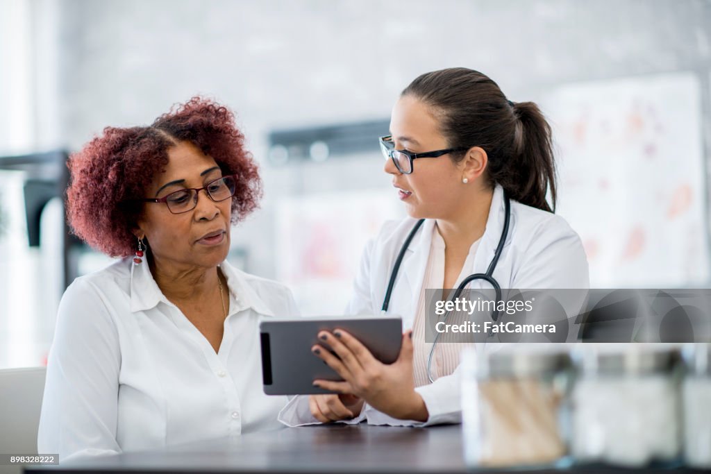 Docctor Using Tech Doctor Using Technology High-Res Stock Photo - Getty Images