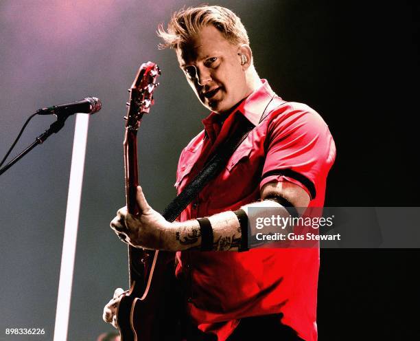 Josh Homme of Queens of the Stone Age performs on stage at Wembley Arena on November 18, 2017 in London, England.