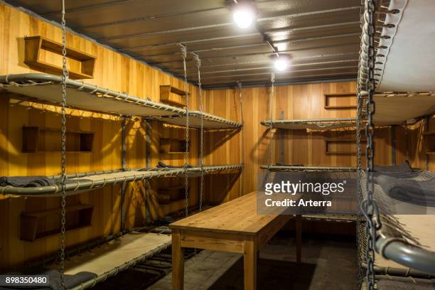 German WWII sleeping quarters with bunk beds in bunker at Raversyde Atlantikwall / Atlantic Wall open-air museum at Raversijde, Flanders, Belgium.