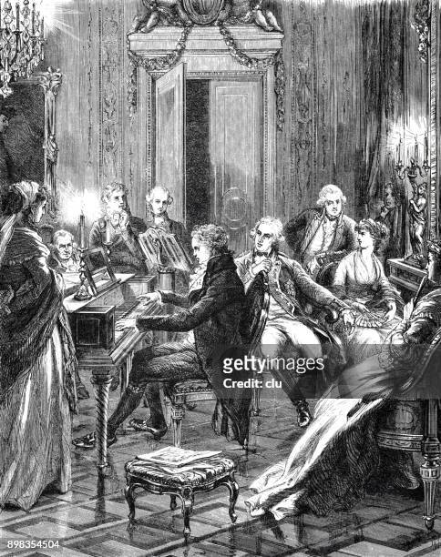 mozart plays piano for prince ferdinand and friends - wolfgang amadeus mozart stock illustrations