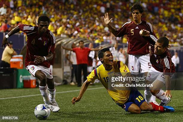 Teofilo Gutierrez of Columbia loses the ball ina tackle against Venezuela during their match at Giants Stadium on August 12, 2009 in East Rutherford,...
