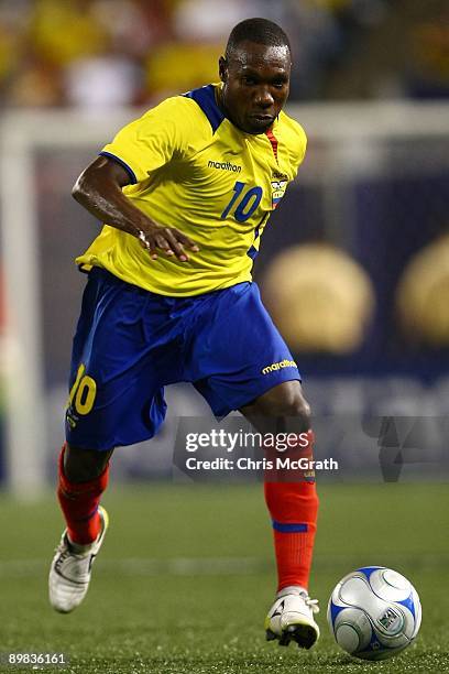Walter Ayovi Corozo of Ecuador looks to pass against Jamaica during their match at Giants Stadium on August 12, 2009 in East Rutherford, New Jersey.