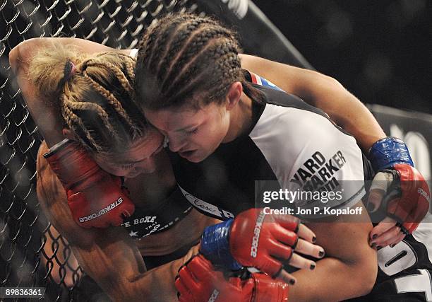 Cris Cyborg battles Gina Carano during their Middleweight Championship fight at Strikeforce: Carano vs. Cyborg on August 15, 2009 in San Jose,...