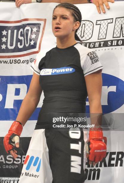 Gina Carano waits for the start of the first round against Cris Cyborg during their Middleweight Championship fight at Strikeforce: Carano vs. Cyborg...