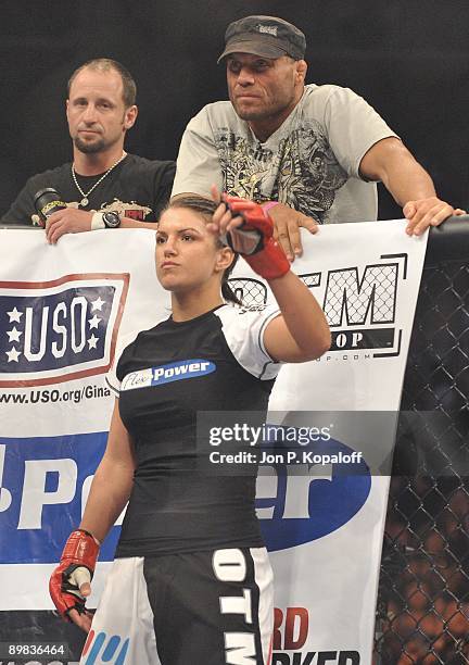 Gina Carano waits for the start of the first round against Cris Cyborg during their Middleweight Championship fight at Strikeforce: Carano vs. Cyborg...