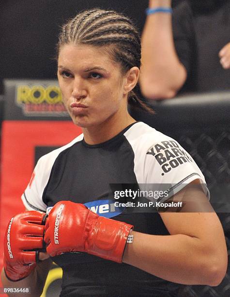 Gina Carano waits for the start of the first round against Cris Cyborg during their Middleweight Championship fight at Strikeforce: Carano vs. Cyborg...