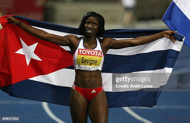 Yargeris Savigne of Cuba celebrates winning the gold medal in the women's Triple Jump Final during day three of the 12th IAAF World Athletics...