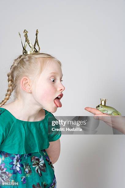 a girl princess and a frog prince - frog prince stock pictures, royalty-free photos & images