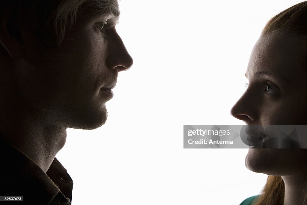 A man and woman, face to face