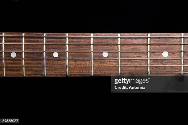 fretboard of an electric guitar - fretboard stock pictures, royalty-free photos & images