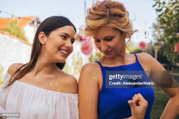 bride to be with a friend at bachelorette party - the bride and the bachelors stock pictures, royalty-free photos & images