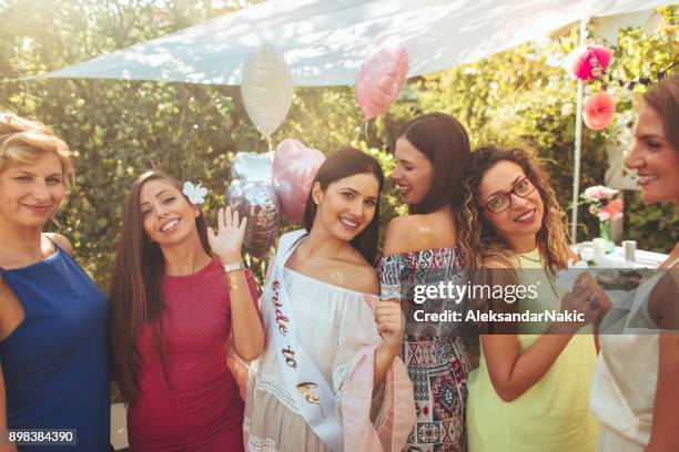 bride to be and bride tribe at bachelorette party - single life stock pictures, royalty-free photos & images