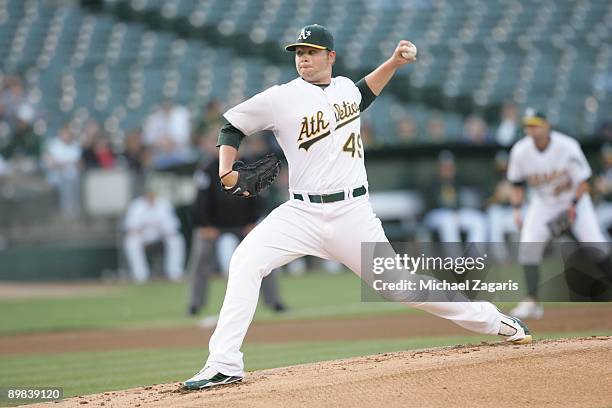 Brett Anderson of the Oakland Athletics pitches during the game against the Detroit Tigers at the Oakland Coliseum on June 29, 2009 in Oakland,...