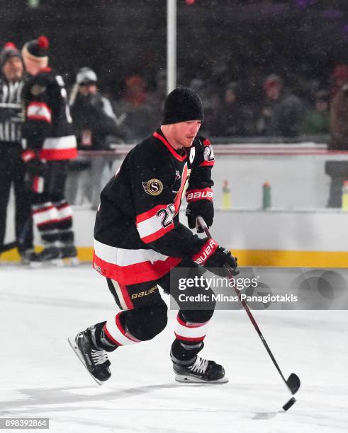 Ottawa Senators alumni Chris Neil stickhandles the puck in warmup during the 2017 Scotiabank NHL100 Classic Ottawa Senators Alumni Game on Parliament...