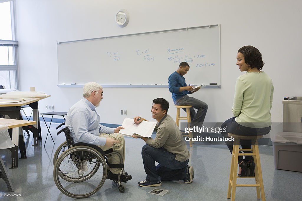 University professor with his students in a classroom