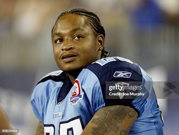 LenDale White of the Tennessee Titans looks on against the Tampa Bay Buccaneers during a preseason NFL game at LP Field on August 15, 2009 in...